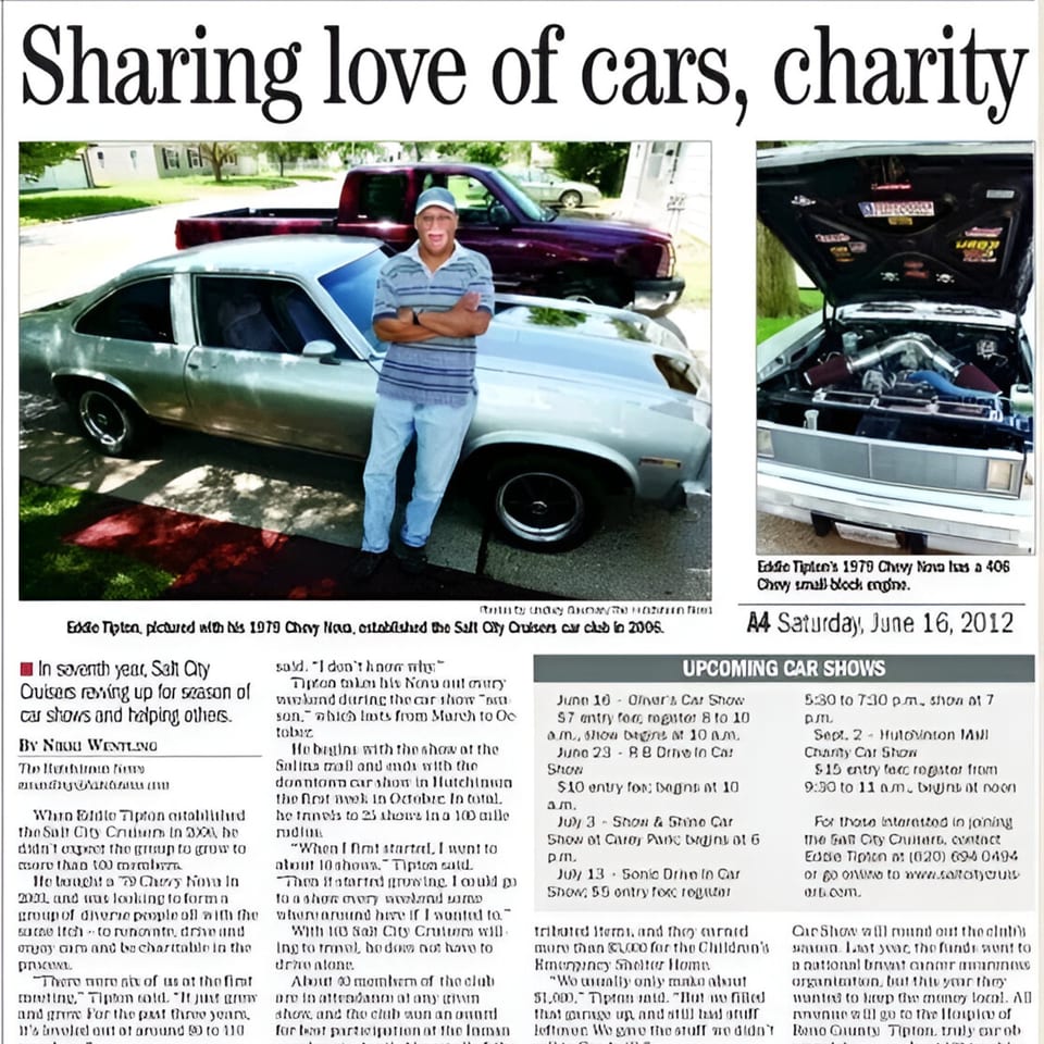 A man stands proudly beside his classic 1979 Chevy Nova, with a red truck in the background.