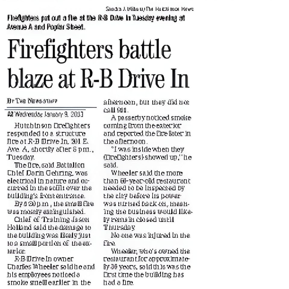 Newspaper article headline: "Firefighters battle blaze at R-B Drive In".